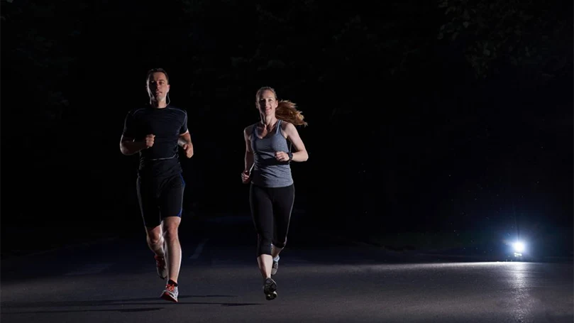 an image of a couple exercising before sleep