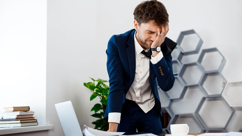 an image of a man being tired at the work