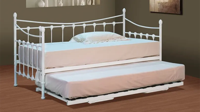 Una imagen de Una cama nido moderna con estructura de metal.