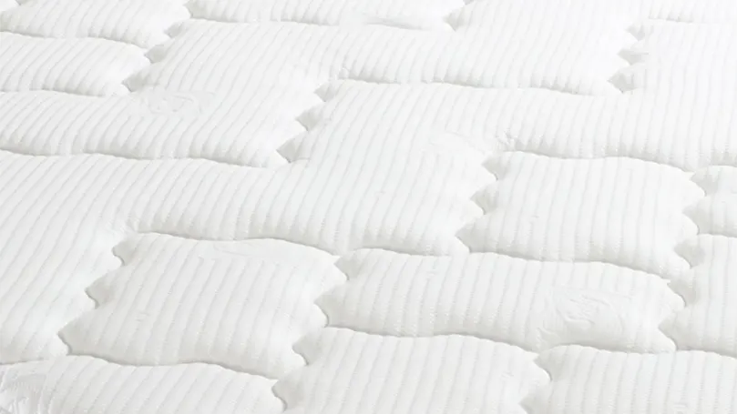 Una imagen de cerca de la funda de colchón Sealy Posturepedic Pearl Luxury Pillow Top.