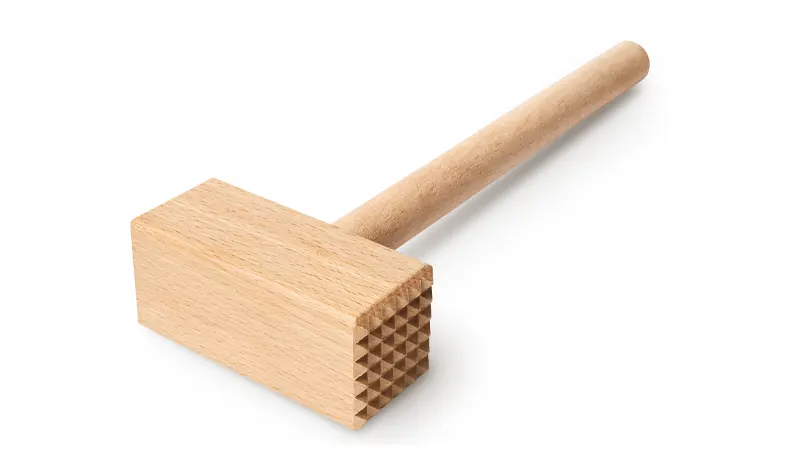 a wooden meat tenderizer.