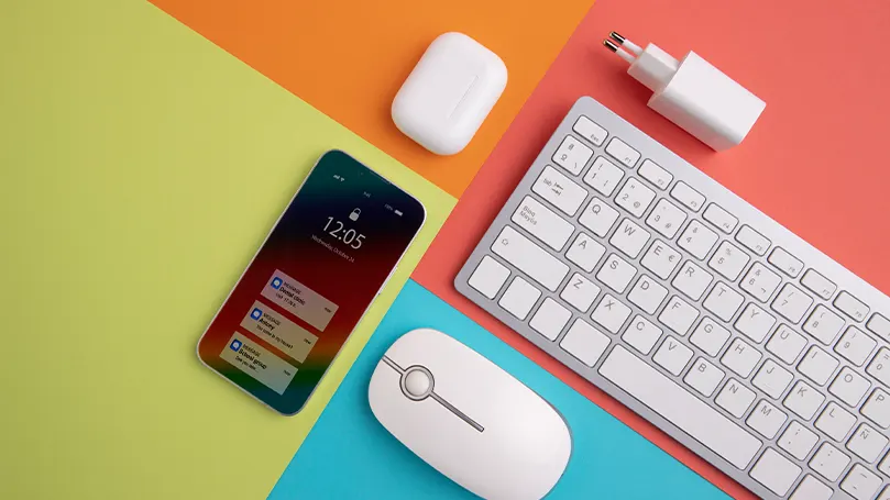 An image of different electronic devices on a table